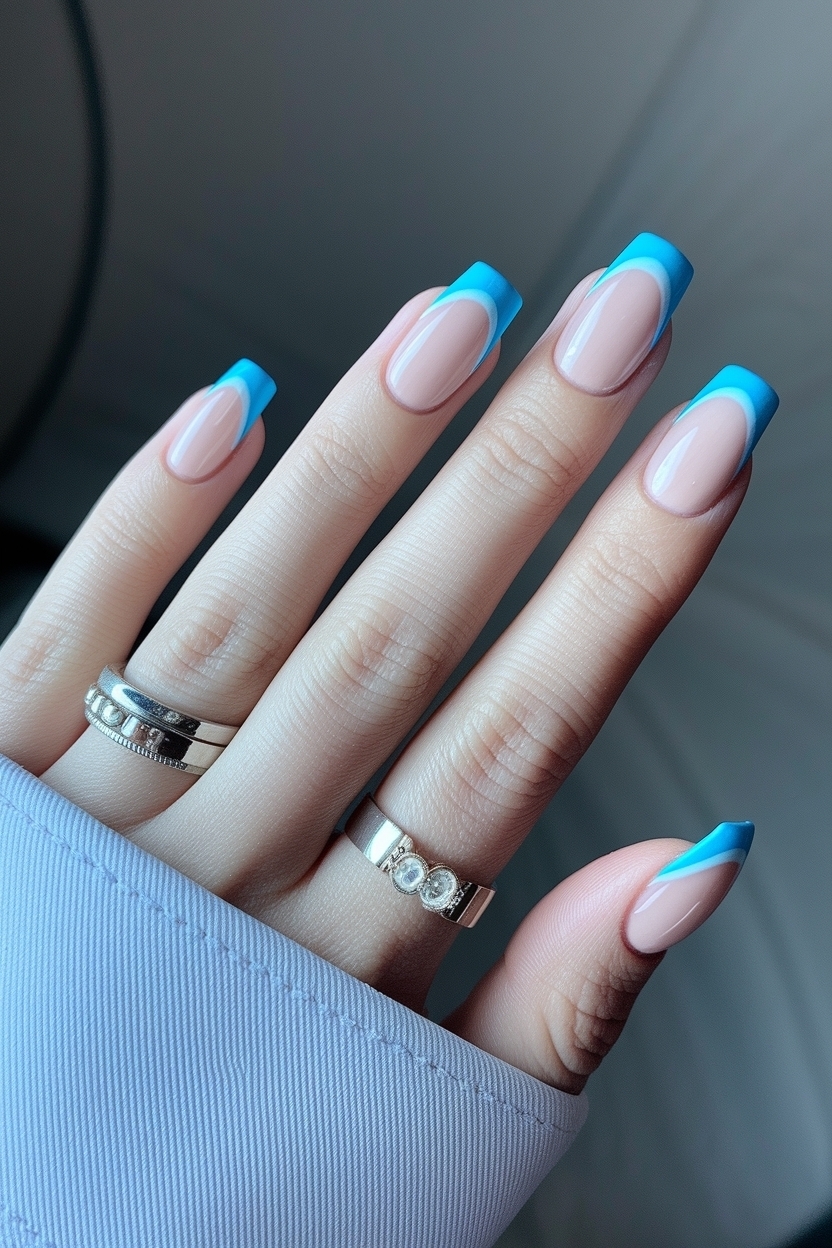 baby_blue_french_tip_nails_metadata_qrg3d.jpg